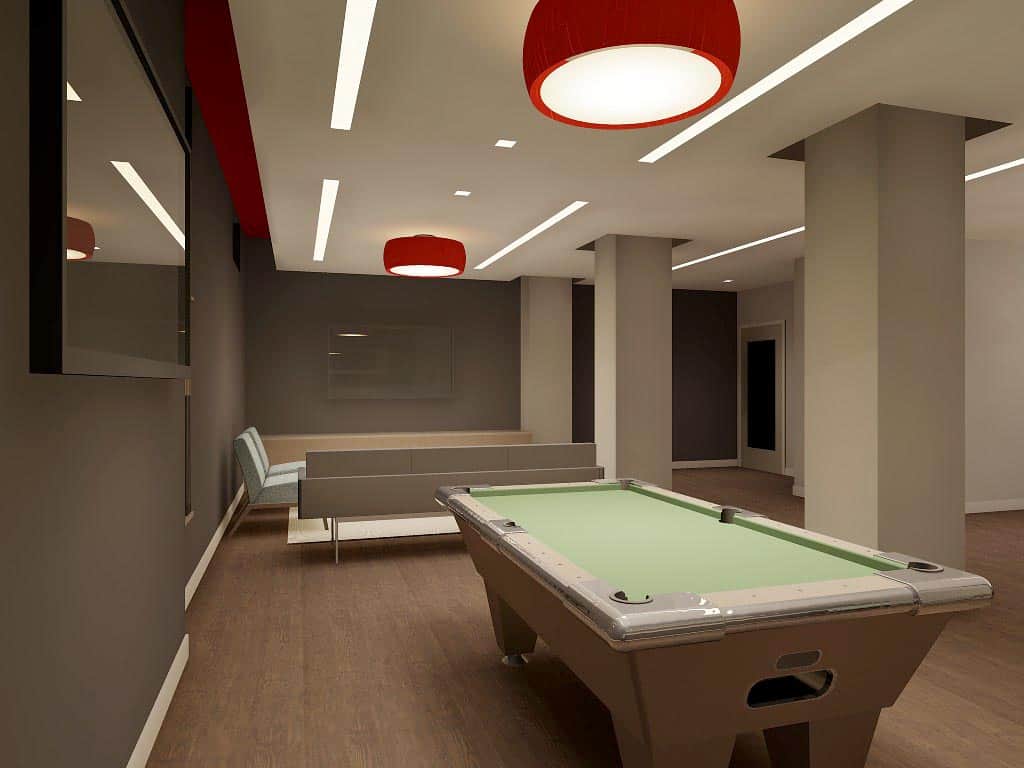 View of Embassy Tower club room with pool table and lounge area