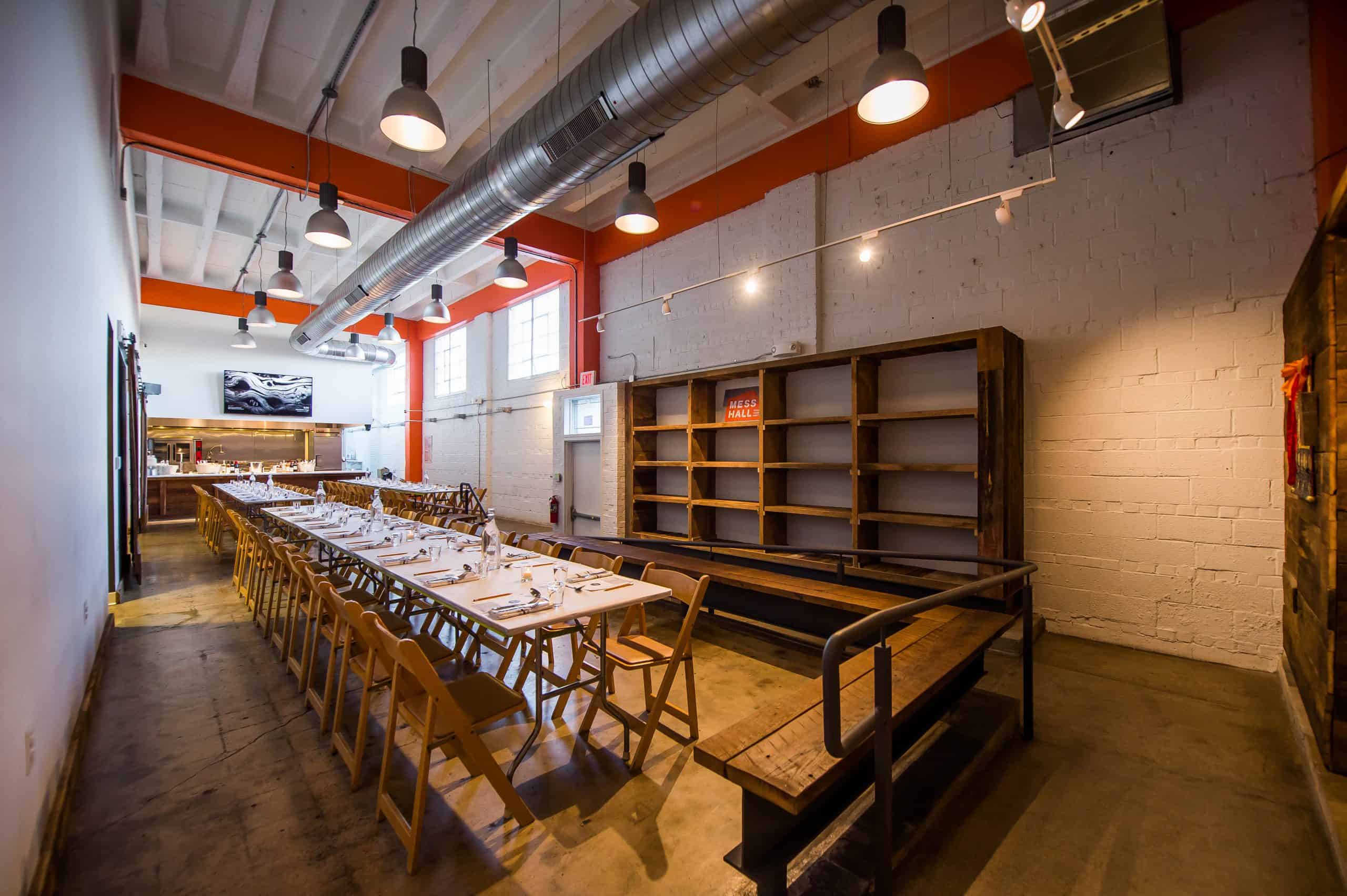 View of the Mess Hall DC event space with tables, built-in shelving and bench